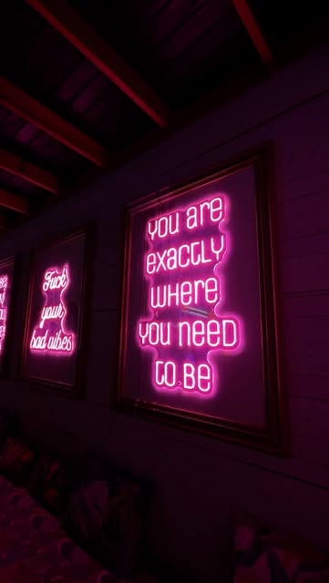 District’s pink neon signs glowing after dark